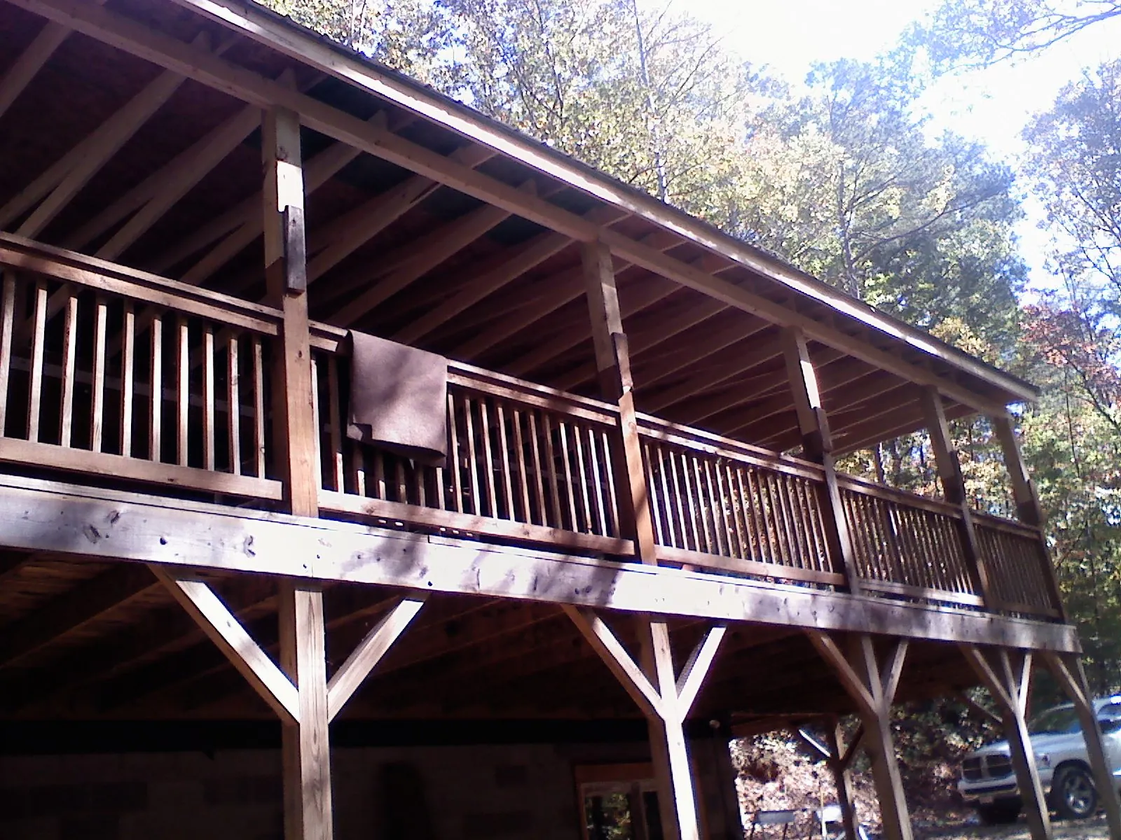 Timber framing under a new elevated porch and deck — Roof Leak Repair in Claremont by Roofing Brothers